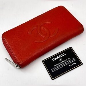Authentic Chanel Wallet Caviar Skin, orange color with Authenticity card.
